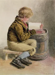 Petit garçon lisant un livre